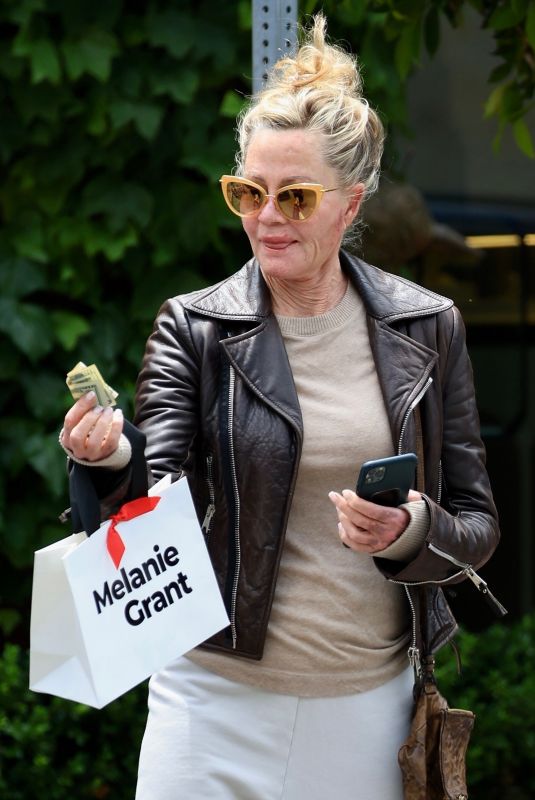 MELANIE GRIFFITH Leaves Melanie Grant Store in Los Angeles 05/11/2023
