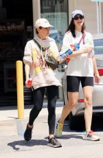 MILA KUNIS Out Shopping with a Friend in Los Angeles 05/17/2023