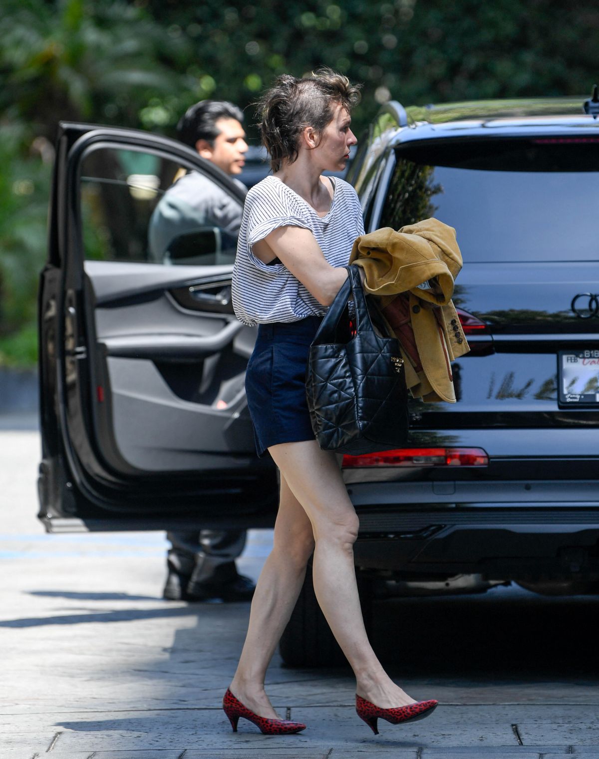 MILLA JOVOVICH Shows New Hairstyle Out in Los Angeles 05/08/2023 ...