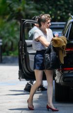 MILLA JOVOVICH Shows New Hairstyle Out in Los Angeles 05/08/2023