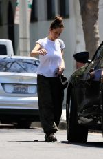MINKA KELLY Leaves a Friend