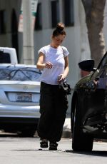 MINKA KELLY Leaves a Friend
