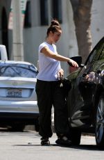 MINKA KELLY Leaves a Friend
