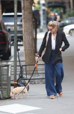 NAOMI WATSS Walks Her Dog Out in New York 05/09/2023
