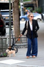 NAOMI WATSS Walks Her Dog Out in New York 05/09/2023