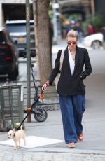 NAOMI WATSS Walks Her Dog Out in New York 05/09/2023