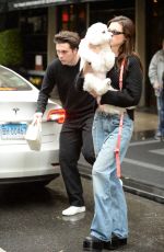 NICOLA PELTZ and Brooklyn Beckham Out with Their Dog in New York 04/29/2023