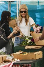OLIVIA WILDE Shopping for Flowers at Farmer
