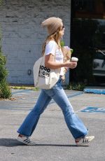 OLIVIA WILDE Shopping for Flowers at Farmer