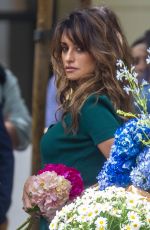 PENELOPE CRUZ on the Set of a Commercial at a Flower Stand in Madrid 05/30/2023