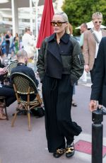 POM KLEMENTIEFF Leaves Martinez Hotel in Cannes 05/16/2023