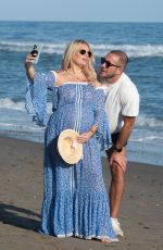 Pregnant DANIELLE ARMSTRONG Out on Her Birthday at a Beach in Marbella 05/03/2023