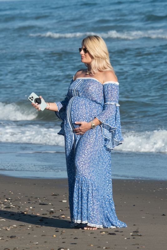 Pregnant DANIELLE ARMSTRONG Out on Her Birthday at a Beach in Marbella 05/03/2023