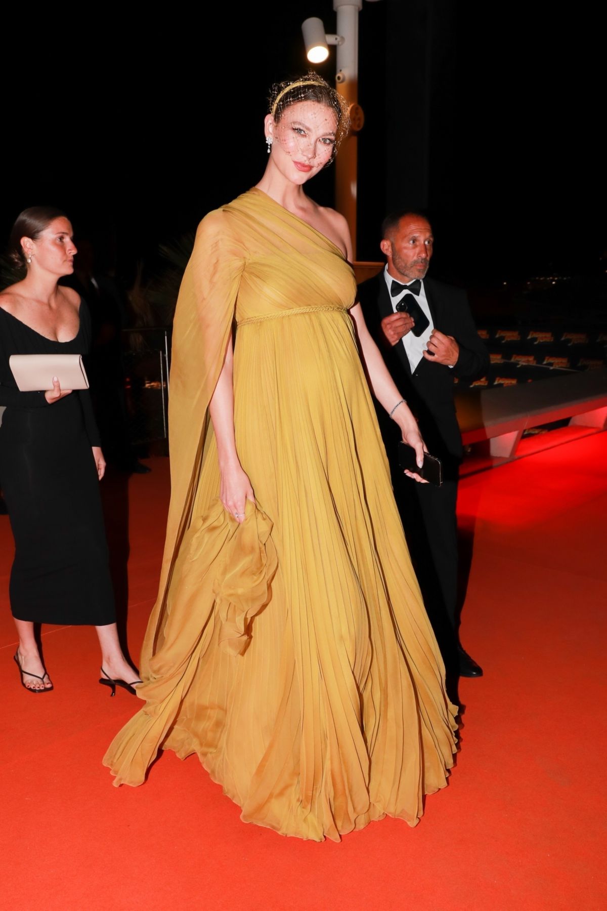 Pregnant KARLIE KLOSS Arrives at Indiana Jones Beach Party in Cannes 05 ...