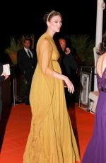 Pregnant KARLIE KLOSS Arrives at Indiana Jones Beach Party in Cannes 05/18/2023
