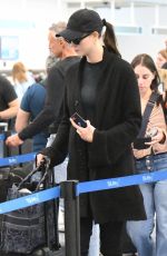 Pregnant KARLIE KLOSS Arrives at Miami International Airport 05/16/2023