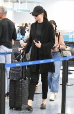 Pregnant KARLIE KLOSS Arrives at Miami International Airport 05/16/2023