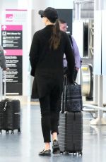 Pregnant KARLIE KLOSS Arrives at Miami International Airport 05/16/2023