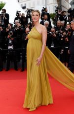 Pregnant KARLIE KLOSS at Indiana Jones and the Dial of Destiny Premiere at 76th Cannes Film Festival 05/18/2023
