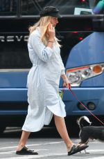Pregnant TAYLOR NEISEN Out with Her Dog in New York 05/25/2023