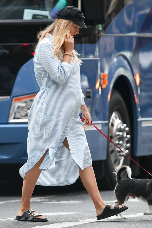 Pregnant TAYLOR NEISEN Out with Her Dog in New York 05/25/2023