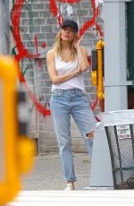 SIENNA MILLER in Ripped Denim Out in New York 05/16/2023