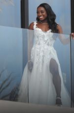 SIMONE BILES on Her Balcony Getting Ready for Ties the Knot with Jonathan Owens in Cabo San Lucas 05/06/2023 