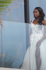 SIMONE BILES on Her Balcony Getting Ready for Ties the Knot with Jonathan Owens in Cabo San Lucas 05/06/2023 