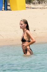 STELLA AMXWELL in Bikini at a Beach with Some Friends 05/29/2022