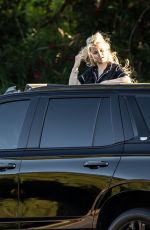 ALABAMA BARKER Standing Out of Sunroof of Her Cadillac Escalade SUV in Calabasas 06/26/2023