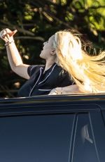 ALABAMA BARKER Standing Out of Sunroof of Her Cadillac Escalade SUV in Calabasas 06/26/2023