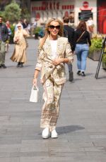 AMANDA HOLDEN Out at a Taxi Bike in London 06/27/2023