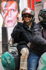 AMANDA HOLDEN Out at a Taxi Bike in London 06/27/2023
