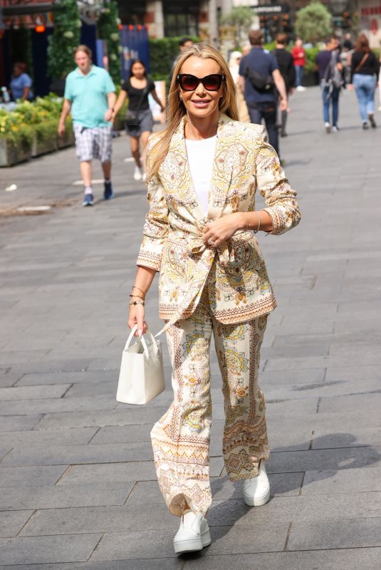 AMANDA HOLDEN Out at a Taxi Bike in London 06/27/2023