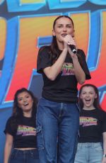 AMBER DAVIES and the cast of Back to the Future Performs in London 06/18/2023