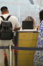 AMY CHILDS at Check in Desk in Paphos International Airport 06/27/2023