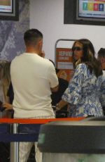 AMY CHILDS at Check in Desk in Paphos International Airport 06/27/2023
