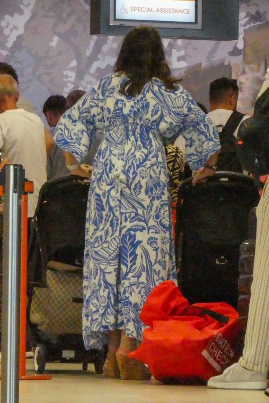 AMY CHILDS at Check in Desk in Paphos International Airport 06/27/2023