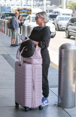 ARIANA MADIX Heading to LAX Airport in Los Angeles 06/08/2023