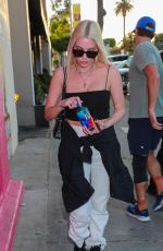 ASHLEY BENSON Arrives at Craig