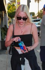 ASHLEY BENSON Arrives at Craig