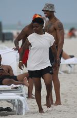 BRE-Z and AND CHRIS AMORE at a Beach in Miami 06/18/2023