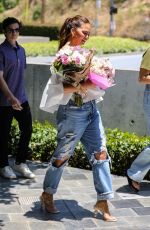 CHRISSY TEIGEN Arrives at a Memorable Kids