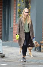 DAPHNE GROENEVELD Out with Her Dog in New York 06/26/2023