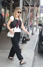 ELIZABETH OLSEN Leaves Her New Book Signing at Barnes & Noble Union Square in New York 06/10/2023