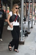 ELIZABETH OLSEN Leaves Her New Book Signing at Barnes & Noble Union Square in New York 06/10/2023