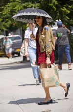 FAMKE JANSSEN Out with Umbrella in New York 05/30/2023