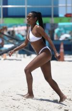 GABRIELLE UNION in a White Bikini at a Beach in Miami 06/15/2023