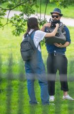 GEMMA CHAN Out with Her Cat Mr Kitty at a Park in London 05/28/2023