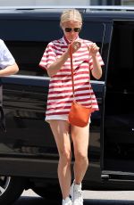 GWYNETH PALTROW Out fopr Lunch with Her Former Husband, Chris Martin and son Moses at Bar Luce in Milan 06/26/2023